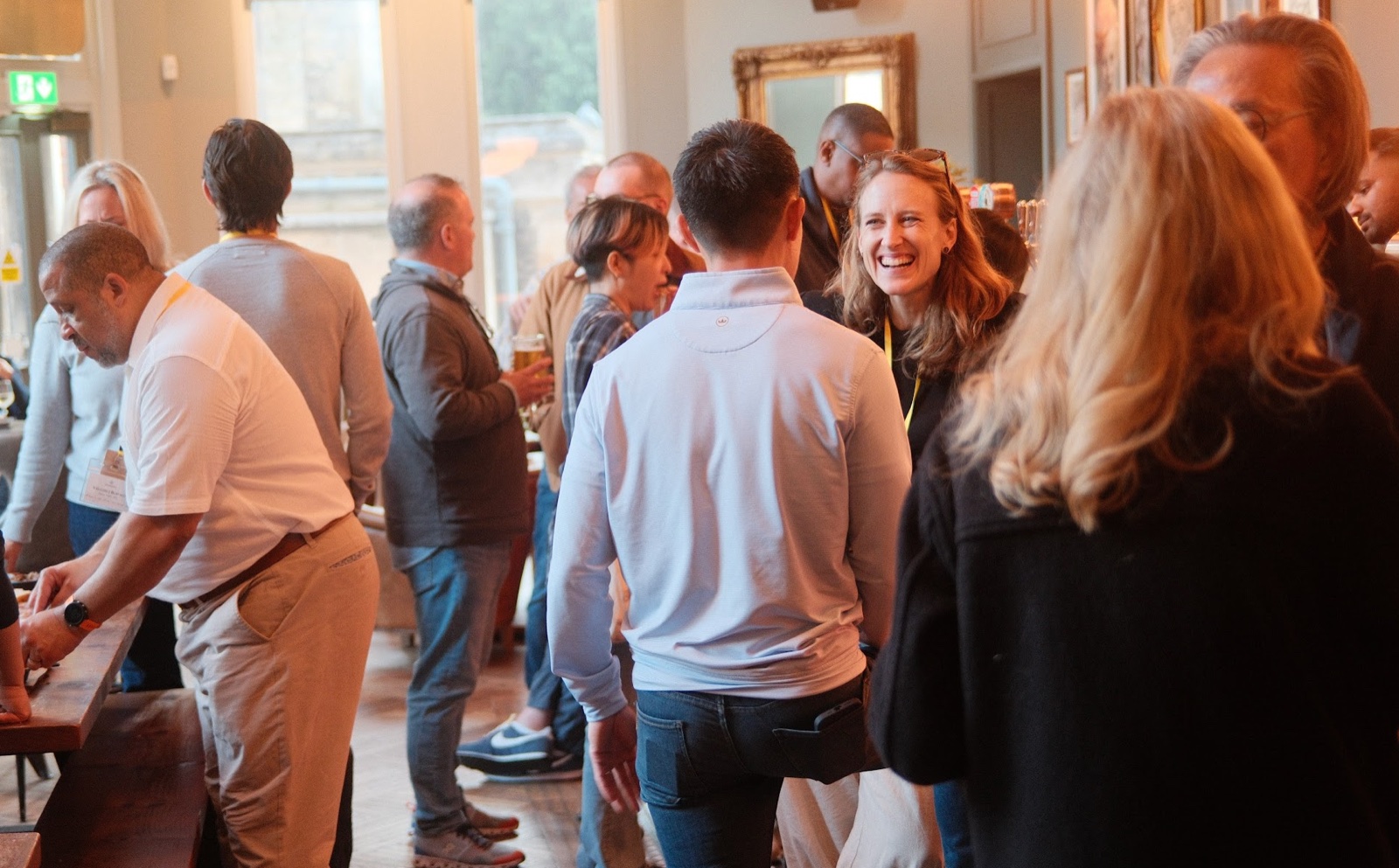 Members in conversation at a reception